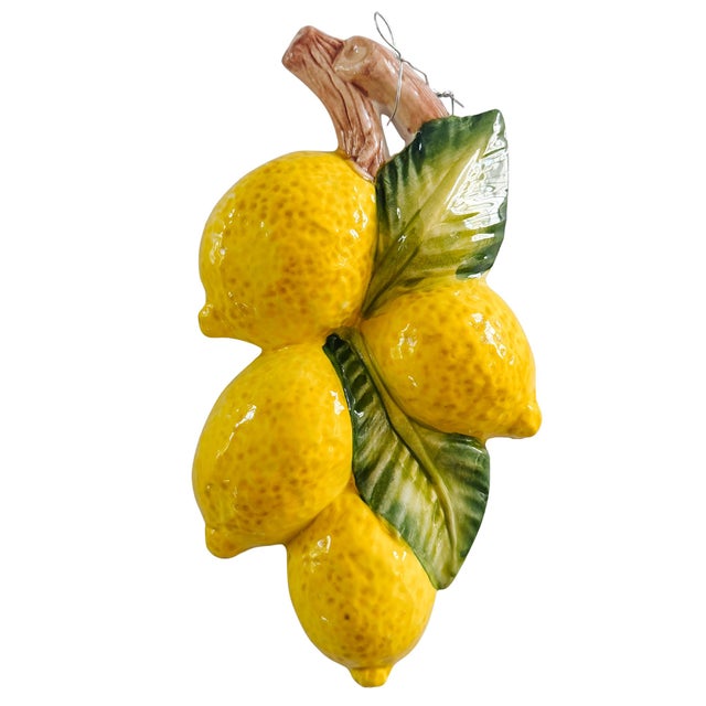 Bring the sun-drenched charm of an Italian orchard directly into your home with this beautiful pair of ceramic lemon wall...