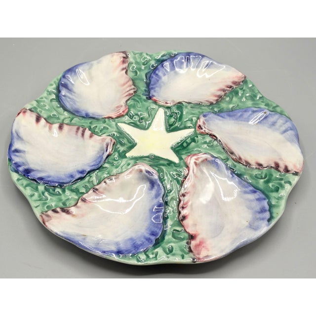 19th-century French majolica oyster plate by Digoin Sarreguemines. Six lovely wells for fresh oysters, hand painted in...