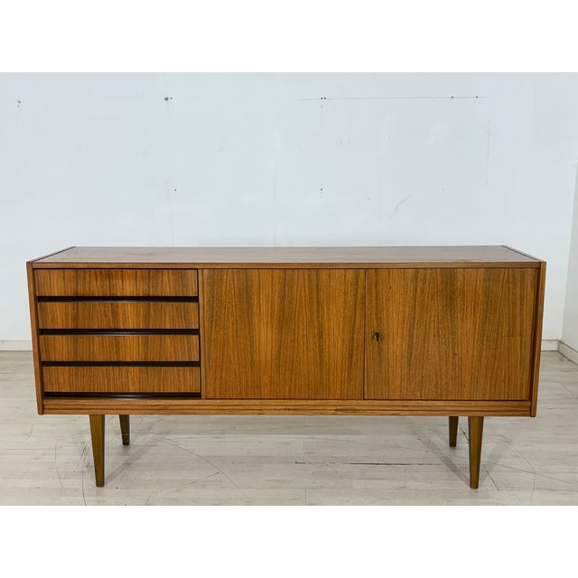 For sale is a very nice vintage sideboard. • German design • 1970s • Key included • Good condition Dimensions: Height:...