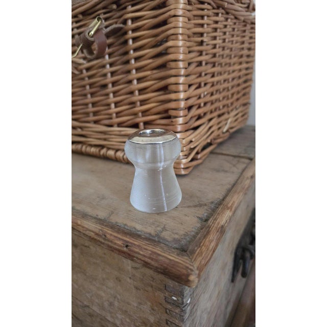 Measurements: 1.5" diameter × 2.5" H (3.8 × 6.4 cm) Weight: 150 g / 0.33 lb Materials: Sterling silver and ribbed glass...