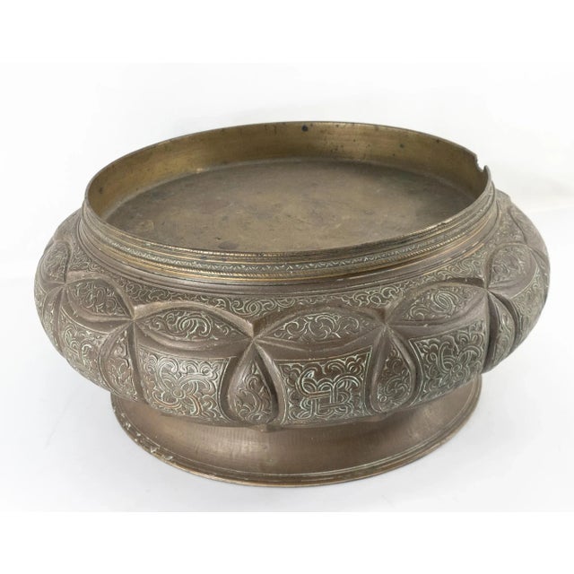 We are selling this interesting Middle Eastern Turkish or Persian style bronze piece that may have been a base or stand...