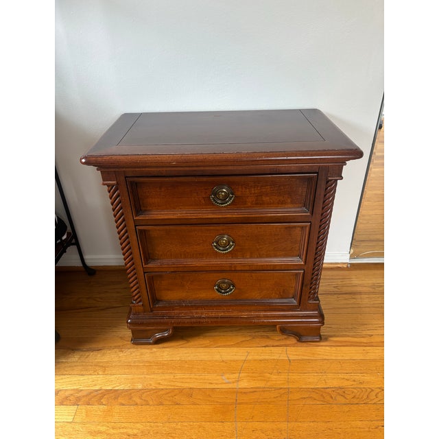 This is a Stanley Furniture British Imperial traditional style cherry three-drawer nightstand. Excellent condition and...