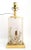 Offering a vintage French style Lucite resin seashell table lamp with original vintage raw silk shade, circa 1980s. This...