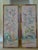 A fabulous pair of hand painted chinoiserie panels with a flower and birds. Framed in a incredibly beautiful custom hand...