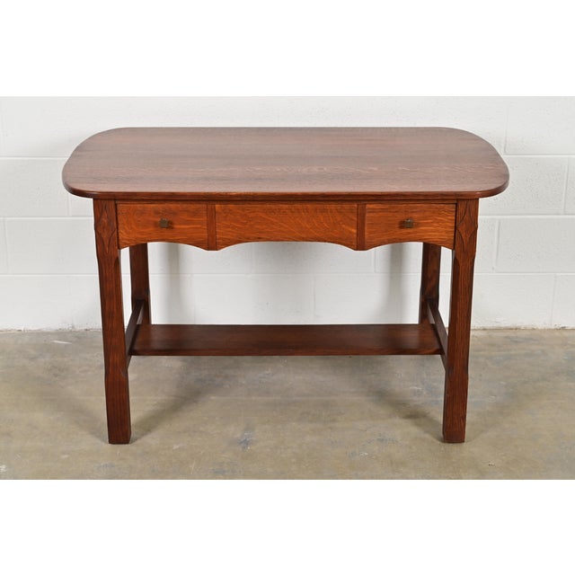 An exceptional antique Mission or Arts & Crafts library table or writing desk By Charles P. Limbert Co. USA, Circa 1910...