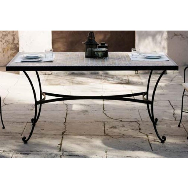 About Patio or garden dining room table in wrought iron with glass top Estructure measurements: Depth 27.5 in Width 47.24...
