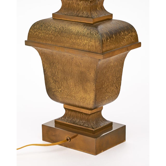 Lamp from France by Maison Charles. This lamp is solid brass; hand embossed. It has been newly wired to fit US standards.