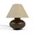 A design of subtle beauty, this table lamp has a brass base with a pleasing orb shape and a rich patina from age....
