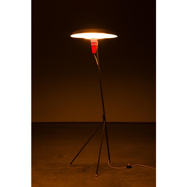 This exceptional piece stands out as a truly rare gem in Dutch design! It showcases a slender grey metal arm anchored to a...