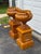 A striking pair of large-scale campana-form garden urns, each set atop a matching square plinth pedestal, finished in a...