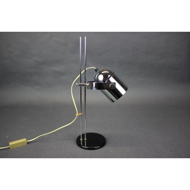 Vintage adjustable table lamp designed by Stanislav Indra and manufactured in Czechoslovakia during the 1960s. The lamp...