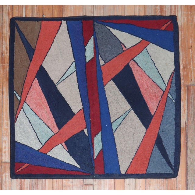 A compelling Mid-20th Century American hooked rug. Measures: 2'11" x 3'2''.