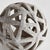 This contemporary little orb is made of thin ceramic strips giving it an open and airy feel. It is perfect in a wide open...
