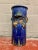how beautiful is this? I love this lapis blue on this umber's stand. it came within two shakes of going into my house,...
