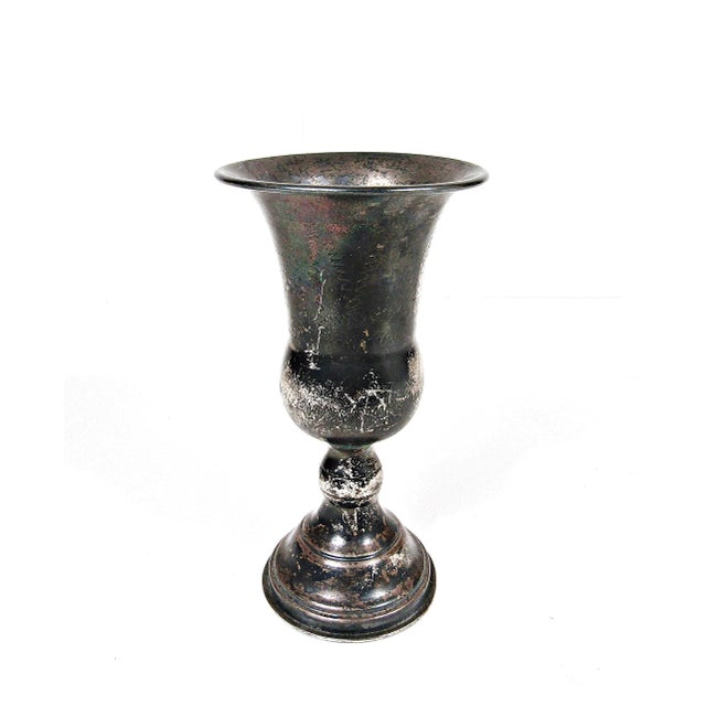 Early 20th-century sterling silver chalice with a refined, minimalist silhouette. Marked “STERLING” on the base and made...