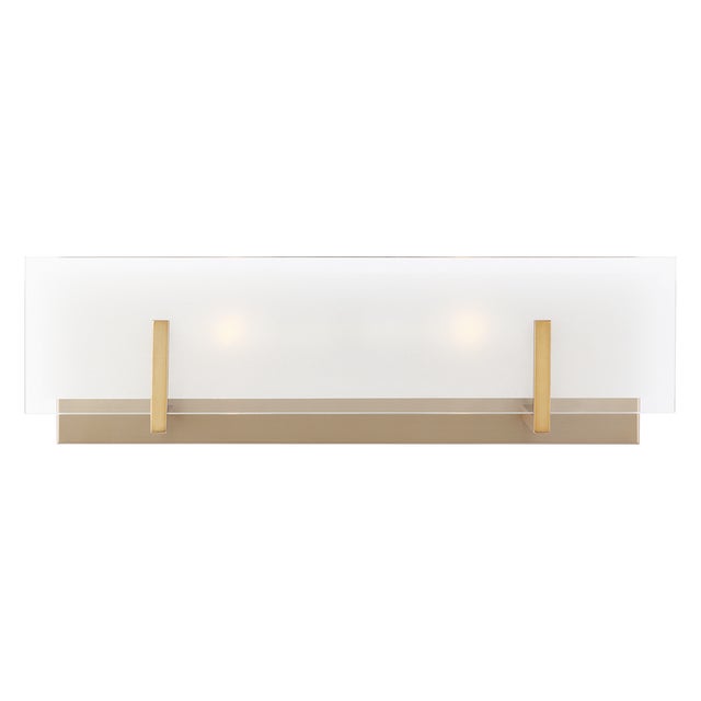 The Syll two light vanity fixture in satin brass offers shadow-free lighting in your powder room, spa, or master bath...