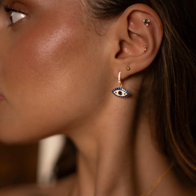 Channel the timeless power of Queen Cleopatra with these exquisite Evil Eye Earrings. Handcrafted from 925 sterling silver...