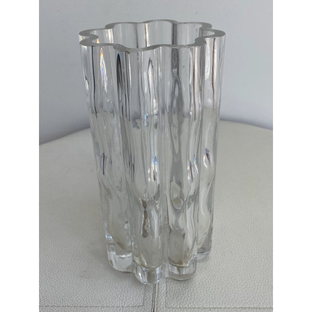 Swedish modern art glass. Translucent hand blown rippled art glass vase by Orrefors Sweden. Unmarked.