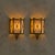 A pair of French sconces from the 1950s, with radiating brass detailing often seen in Riviera interiors from the period....