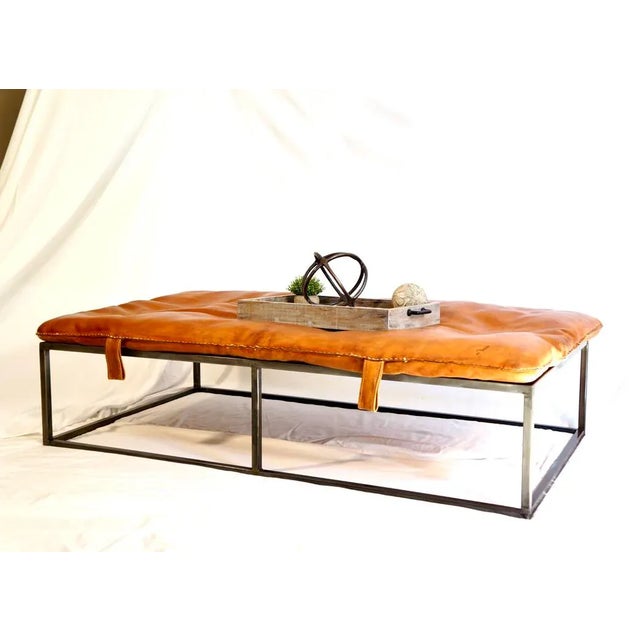 Vintage leather gym mat coffee table with custom steel frame. Authentic leather gym mats like this could be found all over...