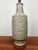 Beautiful pressed texture pottery lamp by Lee Rosen for Design Technics. This great mid-century lamp has a surface design...