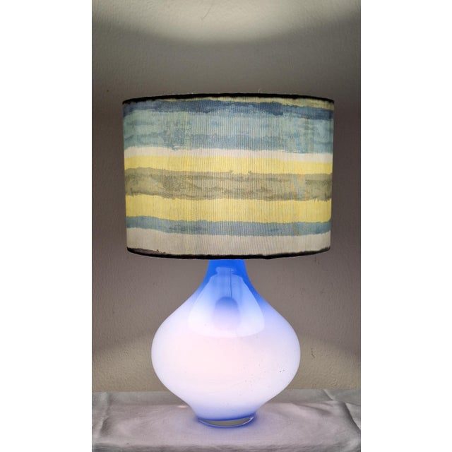 Vintage Table Lamp with Internally Illuminated Blue Glass Base and Fabric Shade, 1970s, in Very Good conditions. Designed...