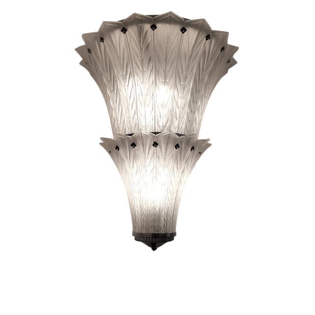 Majestic and impressive French Art Deco chandelier by Marius-Ernest Sabino (Paris, 1930s) Two tiers of molded art glass...