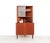 Vintage Danish corner cabinet with display case from the 1960s, made of teak veneer. The cupboard combines closed storage...