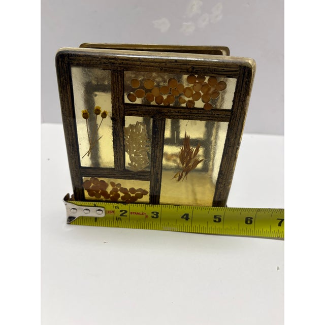 Beautiful vintage lucite/resin napkin holder featuring a faux wood windowpane design with embedded botanicals and seed...