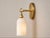 Not Yet Made - Made To Order Handcrafted Brass Wall Sconce With Natural Alabaster Cylinder Shade | Sculptural Accent Light For Sale - Image 5 of 6