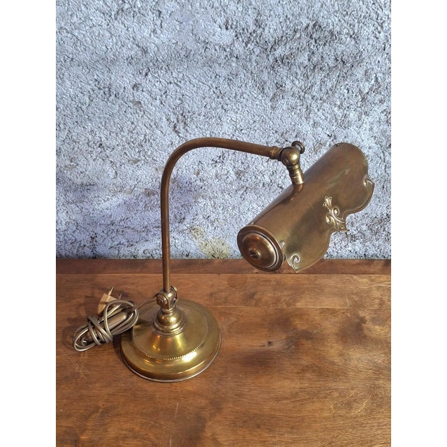 A sumptuous art nouveau desk lamp, crafted entirely from solid brass, likely dating from 1900-1910. Typical of french...