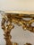 18th century Roman console carved and gilded with a veneered marble top. The gilding is original