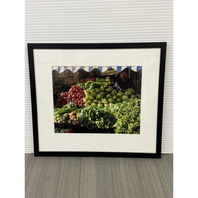Design Plus Gallery presents a Framed Photograph of a Fruit and Vegetable Stand in Israel. The image captures an open-air...