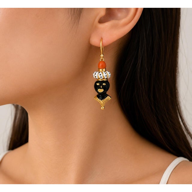 Elegant 18K gold enamel drop earrings featuring black coral in an Americana-inspired design. Estate piece weighing 3...