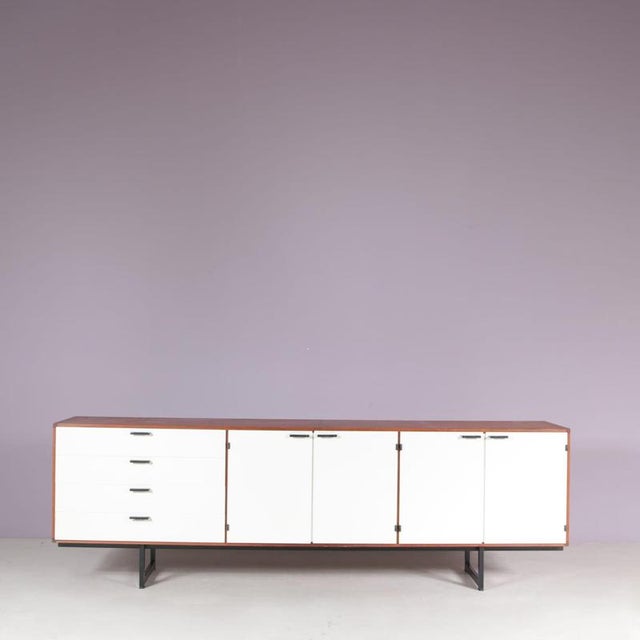 1960s sideboard from the C-serie by Cees Braakman, produced by Pastoe in the Netherlands, is a refined example of post-war...