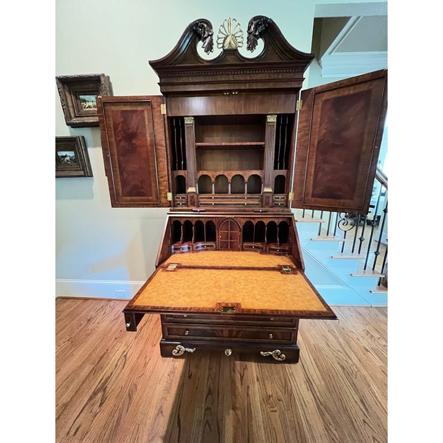 Maitland Smith mahogany secret with leather top.