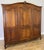 This elegant vintage French Louis wardrobe showcases graceful curves, refined carved detailing, and a beautifully polished...