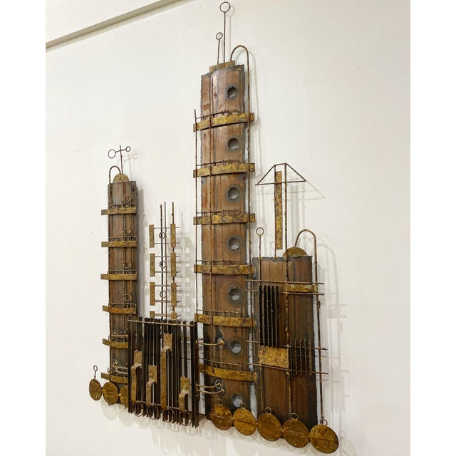 Rare and uncommon midcentury Brutalist style mixed metal cityscape wall sculpture by Peter Pepper Products. Kind of a...