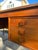 A beautifully crafted Danish mid-century teak desk by Domino Møbler, dating to approximately the 1960s. Featuring a warm...