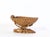 A large hand carved olive wood bowl in the shape of a clam shell. Great for decorative purposes or as a fruit bowl. No...