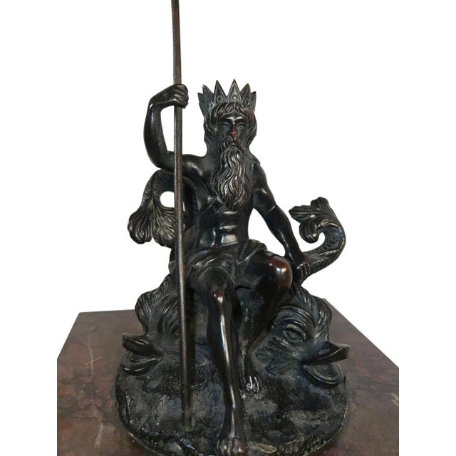 Bronze figure of Neptune with two dolphins mounted on a marble base very fine quality Circa 1850 France.