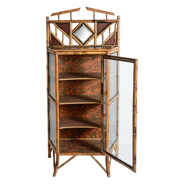 This is a smart looking and very useful, French 19Th. c. Aesthetic movement Bamboo & Glass Cabinet, 1880-1900 The...