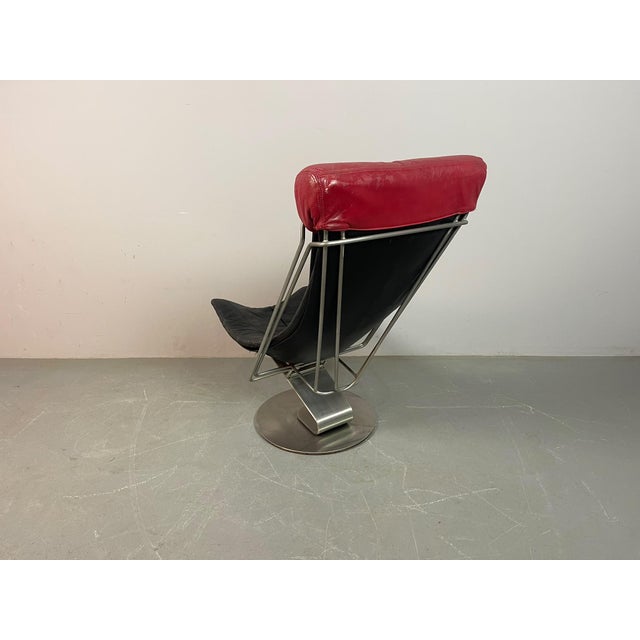 A distinctive interdane lounge chair, designed by danish designer oluf lund and originally produced by trio-line a/s,...