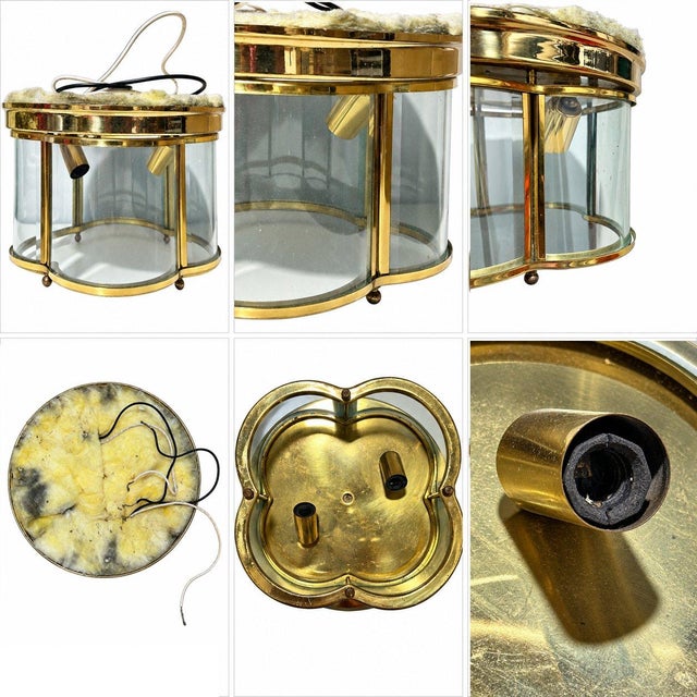 Add a distinctive vintage accent to your interior with this elegant iridescent glass and brass light fixture. The...