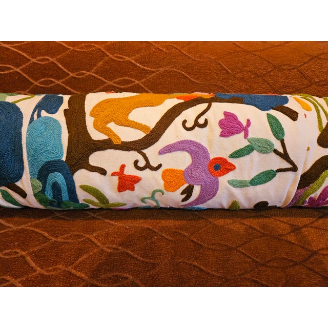 this is a very long pillow, made of a clarence house select "animal kingdom" crewel fabric, filled with down and feather,...