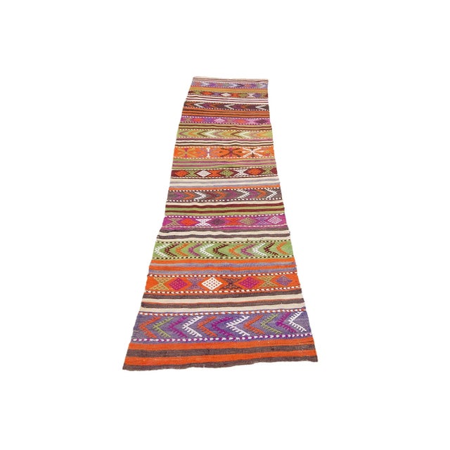 Vintage handwoven decorative kilim runner from Denizli region of Turkey. Approximately 45-55 years old. In very good...