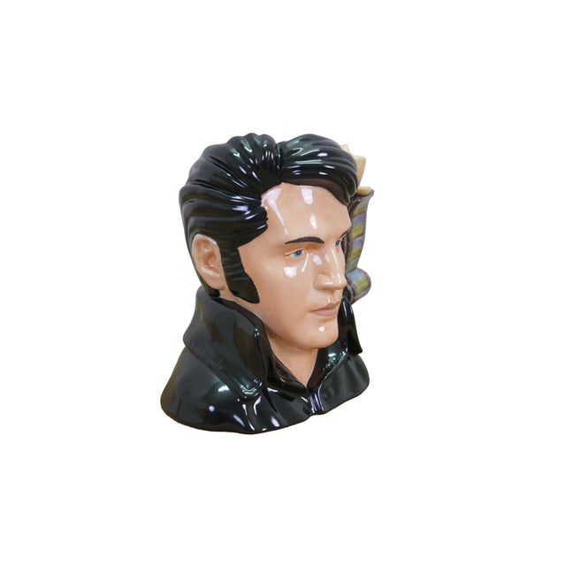 Large vintage Royal Doulton porcelain character jug of Elvis featuring a handle with a cowboy hat, film reel, boxing...
