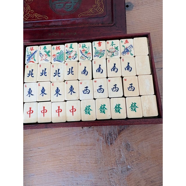 A wonderful complete vintage Chinese mahjong set, with all tiles hand-cut from bone and bamboo — you can see the warm...
