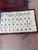 A wonderful complete vintage Chinese mahjong set, with all tiles hand-cut from bone and bamboo — you can see the warm...