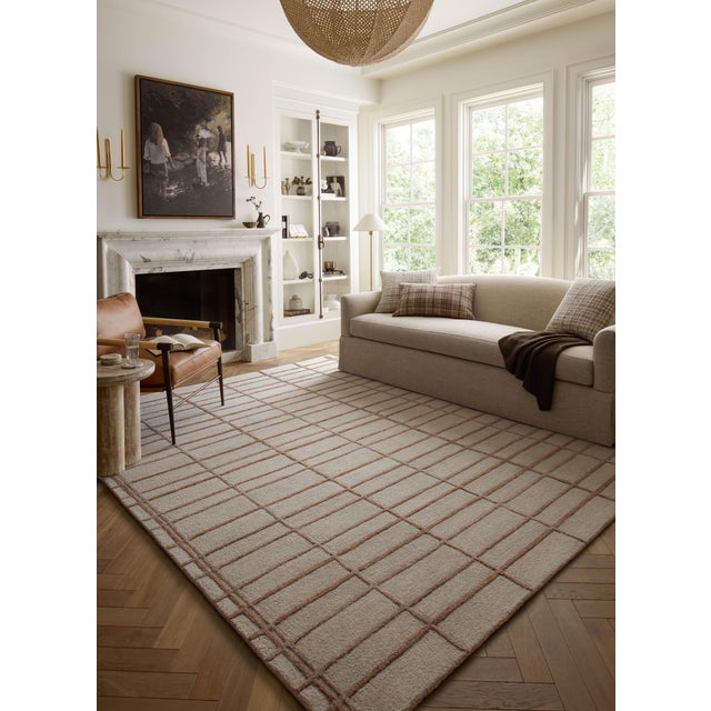 The Bradley Collection from Chris Loves Julia x Loloi takes the classic striped rug to new heights. This hand-tufted, 100%...